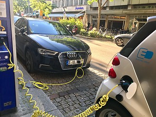 Image showing Close up of electric cars being charging