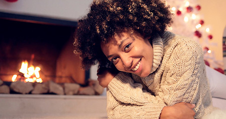 Image showing Lovely black woman in sweater and leggings