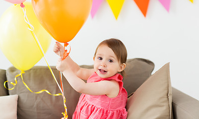 Image showing happy baby girl on birthday party at home