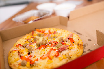 Image showing Delicious pizza in paper box