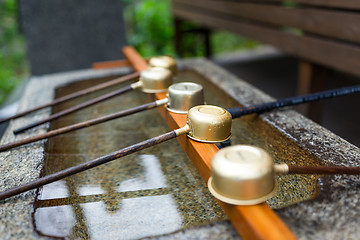 Image showing Japanes wooden ladle in shrine 