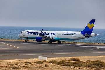 Image showing ARECIFE, SPAIN - APRIL, 16 2017: AirBus A321 of ThomasCook.com w