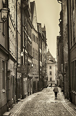 Image showing STOCKHOLM, SWEDEN - AUGUST 19, 2016: View of narrow street and c