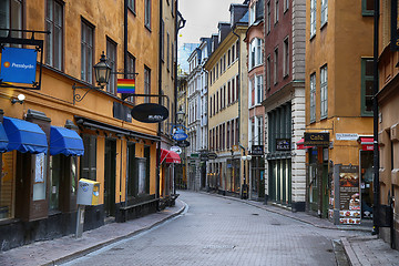 Image showing STOCKHOLM, SWEDEN - AUGUST 20, 2016: View of narrow street and c