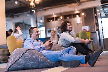 Image showing startup Office Workers Playing computer games