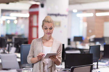 Image showing Business Woman Using Digital Tablet in front of startup Office