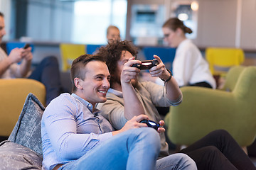 Image showing startup Office Workers Playing computer games