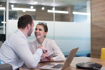 Image showing Business People Working With Tablet in startup office