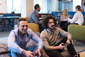 Image showing startup Office Workers Playing computer games