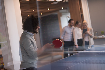 Image showing startup business team playing ping pong tennis