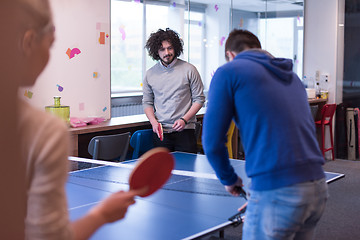 Image showing startup business team playing ping pong tennis