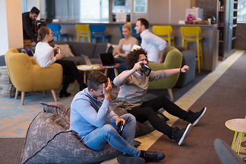 Image showing startup Office Workers Playing computer games