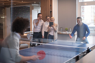 Image showing startup business team playing ping pong tennis