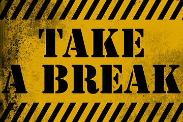 Image showing Take a break sign yellow with stripes