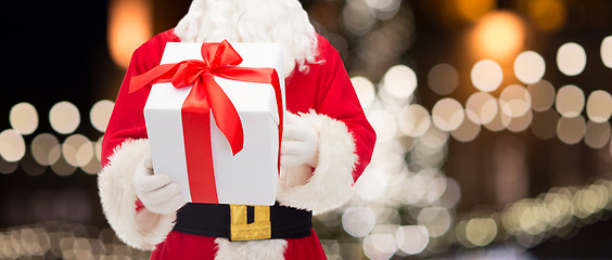 Image showing close up of santa claus with christmas gift