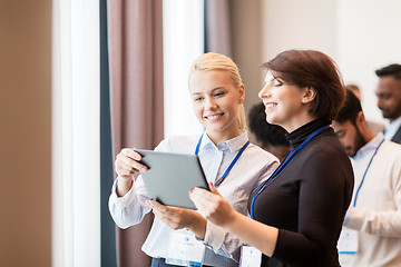 Image showing team with tablet pc at business conference