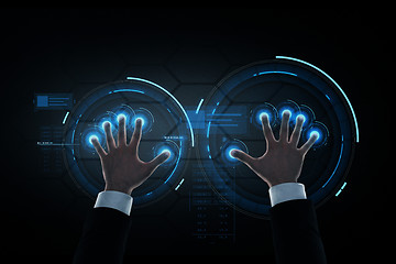 Image showing businessman hands with virtual projection