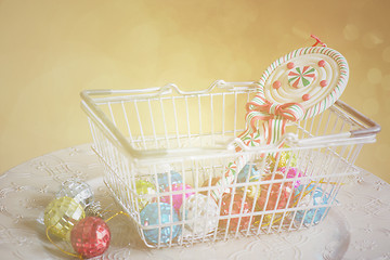 Image showing Christmas decorations in shopping basket