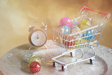 Image showing Christmas toys in shopping trolley, retro toned