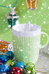 Image showing Cup and christmas toys