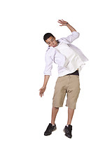 Image showing Young boy jumping over white background