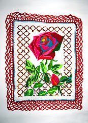 Image showing embroidered flower on fabric