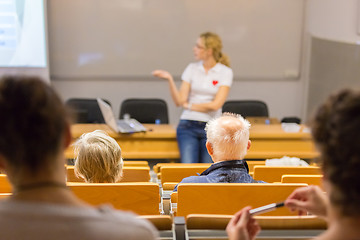 Image showing Instructor teaching first aid cardiopulmonary resuscitation workshop.