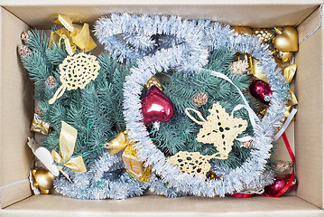 Image showing christmas tree, glitter baubles and tinsel in the box