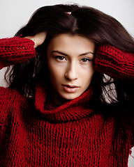 Image showing young pretty woman in sweater and scarf all over her face, lifestyle people winter concept