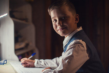 Image showing pupil boy does his homework