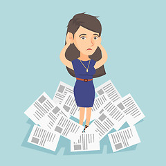 Image showing Stressed business woman having lots of work to do.