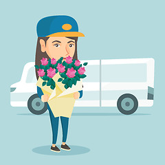 Image showing Delivery courier holding bouquet of flowers.