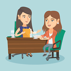 Image showing Two caucasian business women at business meeting.