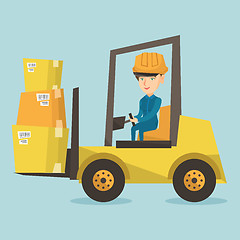 Image showing Warehouse worker moving load by forklift truck.