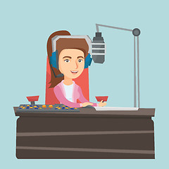 Image showing Young female caucasian dj working on radio.