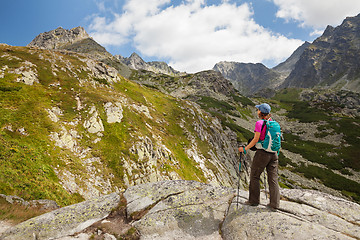 Image showing Hiking woman admiring the beauty of rocky Tatra mountains