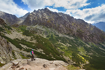 Image showing Hiking woman admiring the beauty of rocky Tatra mountains