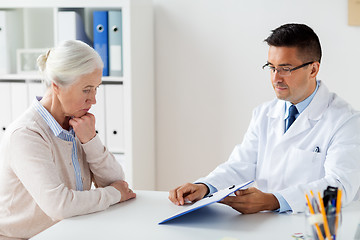 Image showing senior woman and doctor meeting at hospital