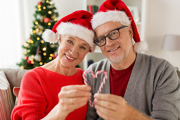 Image showing close up of happy senior couple at christmas