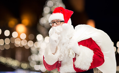 Image showing man in costume of santa claus with bag