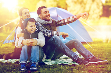 Image showing happy family with tent at camp site