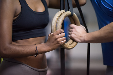 Image showing Portrait of multiethnic couple  after workout at gym