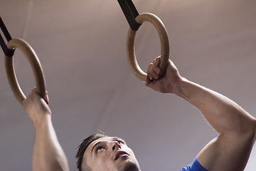 Image showing man doing dipping exercise