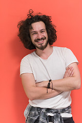 Image showing young man with funny hair over color background