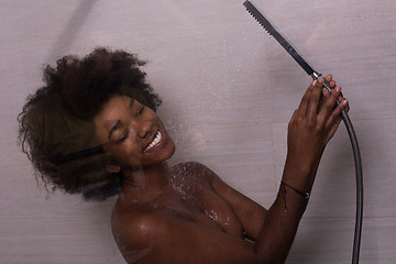 Image showing African American woman in the shower