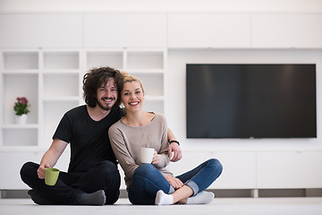 Image showing young couple in their new home