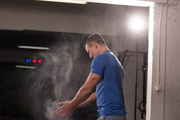 Image showing Gym Chalk Magnesium Carbonate hands clapping man