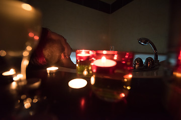 Image showing man relaxing in the jacuzzi