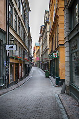 Image showing STOCKHOLM, SWEDEN - AUGUST 20, 2016: View of narrow street and c