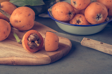 Image showing loquats on kitchen counter